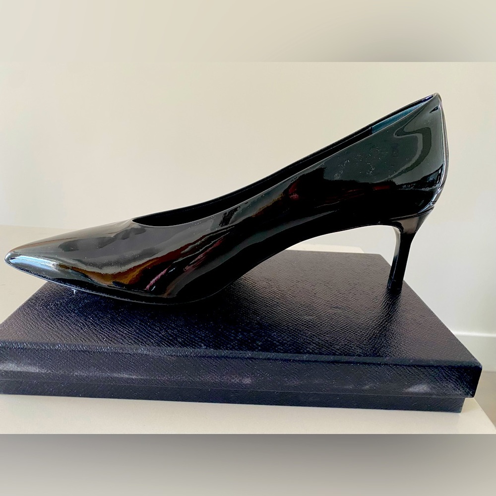 New (never worn) unboxed black Via Spiga patent leather pumps.